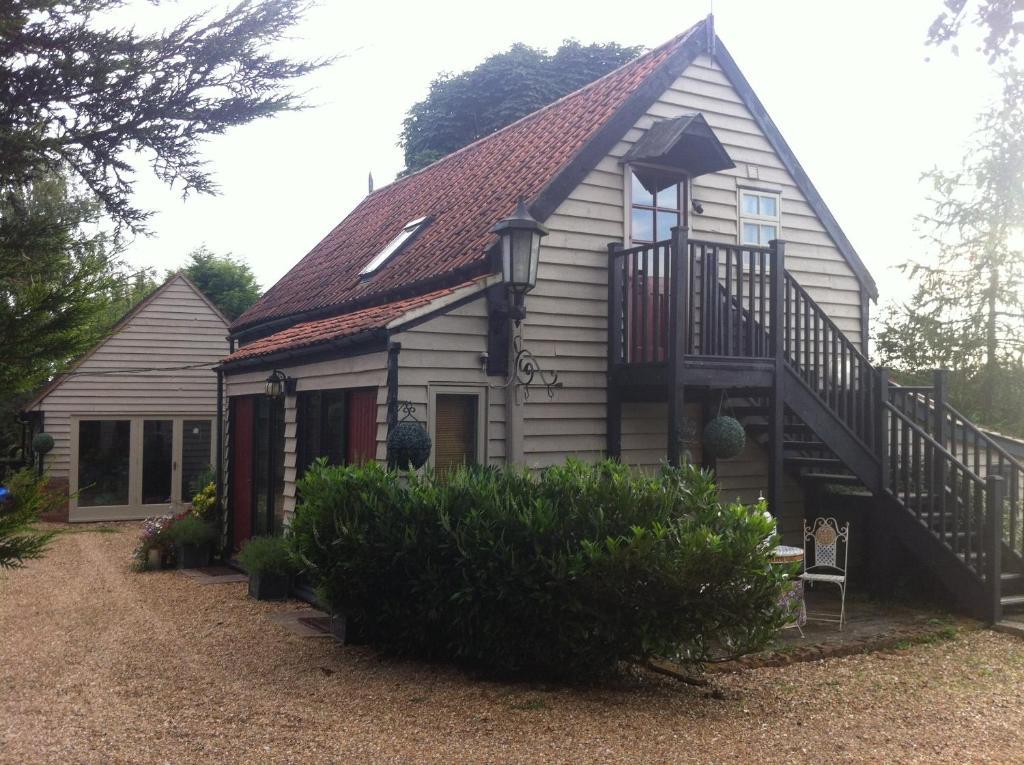 Bonningtons Stansted Self Catering Hotel สแตนสเต็ด เมาท์ฟิทเช็ต ห้อง รูปภาพ